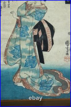 Kiyo-e estampe encadrée de Kuniyoshi. Oban tate-e représentant une courtisane