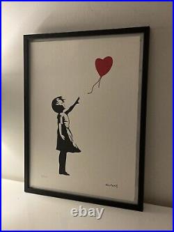 Lithographie banksy avec certificat et encadrée Lithographie banksy avec certificat et encadrée