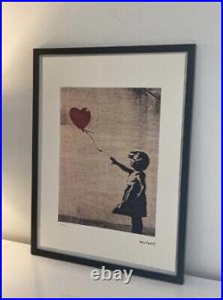 Lithographie banksy avec certificat et encadrée