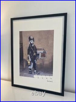 Lithographie banksy avec certificat et encadrée