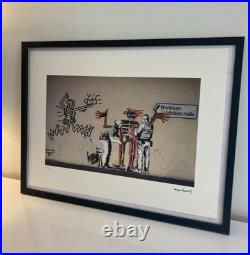 Lithographie banksy avec certificat et encadrée
