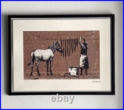 Lithographie banksy avec certificat et encadrée