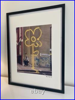 Lithographie banksy avec certificat et encadrée Lithographie banksy avec certificat et encadrée