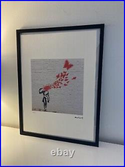 Lithographie banksy avec certificat et encadrée