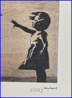 Lithographie banksy avec certificat et encadrée