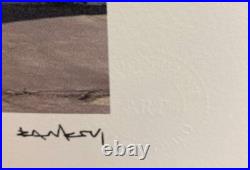 Lithographie banksy avec certificat et encadrée Lithographie banksy avec certificat et encadrée