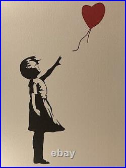 Lithographie banksy avec certificat et encadrée