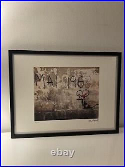 Lithographie banksy avec certificat et encadrée