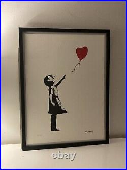 Lithographie banksy avec certificat et encadrée