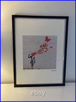 Lithographie banksy avec certificat et encadrée