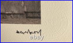 Lithographie banksy avec certificat et encadrée