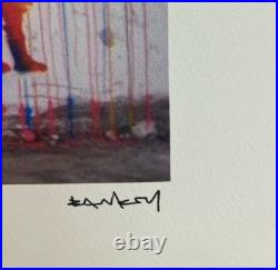 Lithographie banksy avec certificat et encadrée Lithographie banksy avec certificat et encadrée