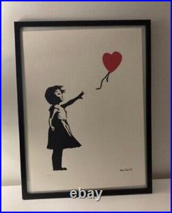 Lithographie banksy avec certificat et encadrée