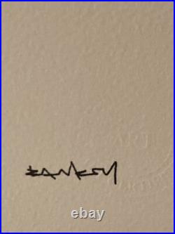Lithographie banksy avec certificat et encadrée Lithographie banksy avec certificat et encadrée