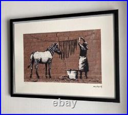 Lithographie banksy avec certificat et encadrée