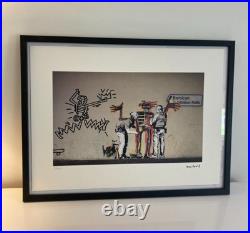 Lithographie banksy avec certificat et encadrée